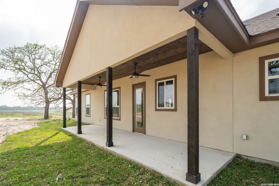 Exterior details and patio area of a home in , Floresville (Image 23).