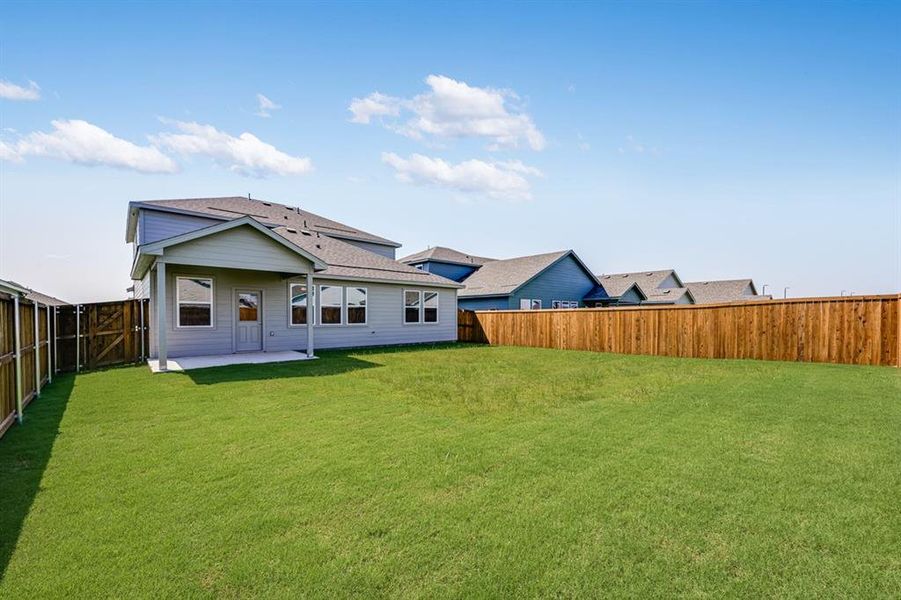 Front exterior of a new home in River Ridge, Crandall, TX, highlighting curb appeal (Image 19). Front exterior of a new home in River Ridge, Crandall, TX, highlighting curb appeal (Image 19).