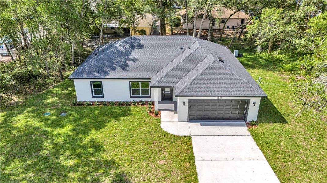 Front exterior of a new home in , Orange City, FL, highlighting curb appeal (Image 22).
