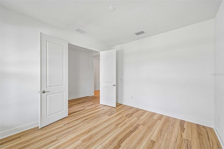 Spacious, unfurnished interior of a new home in Creeks Edge at Twin Rivers, Parrish (Image 22).