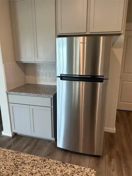 Close-up of interior finishes inside a home in Sunterra, Katy (Image 10).