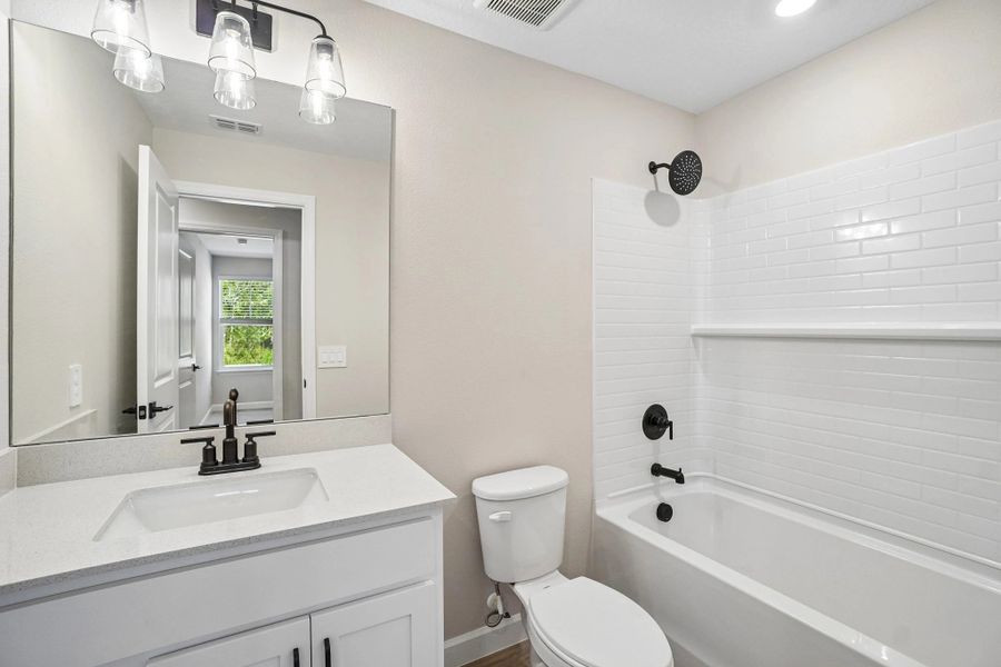 Bathroom 2 near bedroom 2 and 3 and features aspects of AW Collection® Harmony