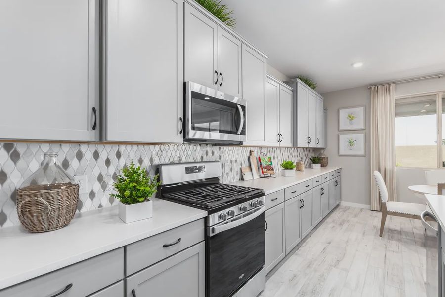 Representative furnished interior of a home built from the 2326 by Elliott Homes in Acacia at Santana, Yuma (Image 17).
