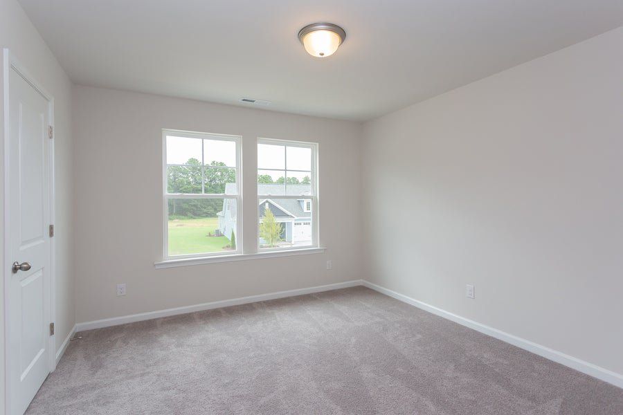 Representative unfurnished interior of a home built from the The Sycamore by Chesapeake Homes in Traditions at Carolina Forest, Myrtle Beach (Image 25).