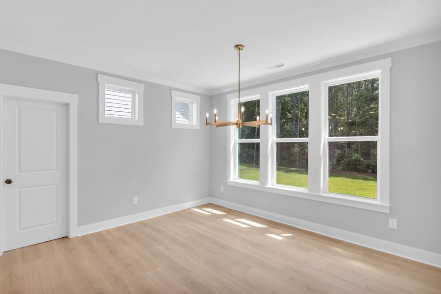 Representative unfurnished interior of a home built from the The Hampton by RobuckHomes in Stonehenge, Raleigh (Image 77).
