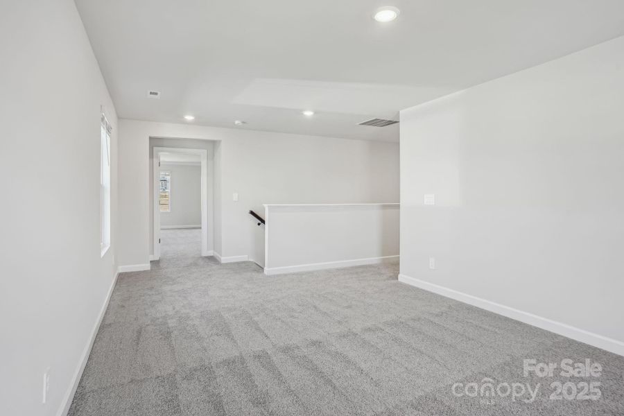 Photo is not of the actual home, but is an inspirational photo of builder’s model home and may depict options, furnishings, and/or decorator features that are not included