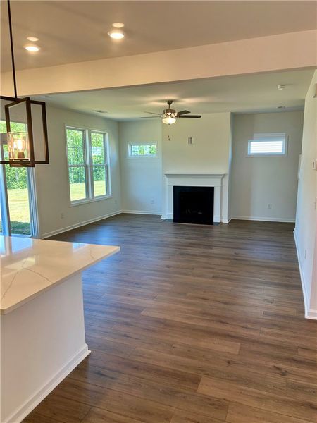 This inviting living space features warm flooring,