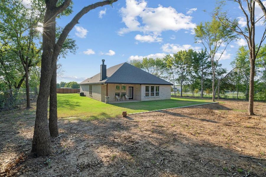 Front exterior of a new home in , Gainesville, TX, highlighting curb appeal (Image 20). Front exterior of a new home in , Gainesville, TX, highlighting curb appeal (Image 20).