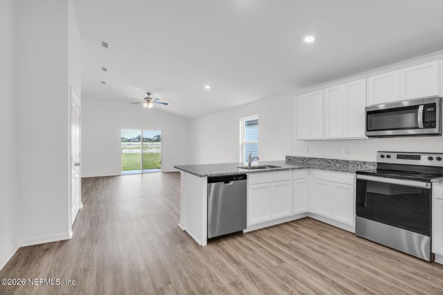 Furnished interior view inside a new home in Rolling Hills, Green Cove Springs (Image 6).