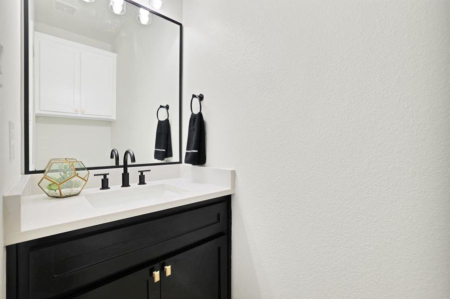 Bathroom featuring vanity