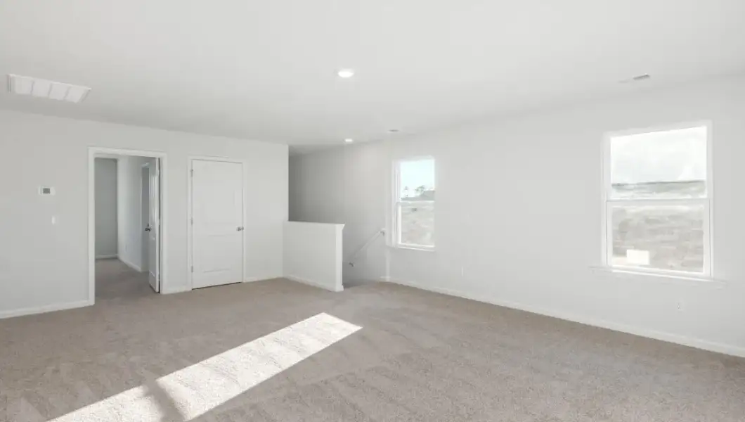 Representative unfurnished interior of a home built from the Robie by D.R. Horton in Saunders Village, Northwest (Image 18).