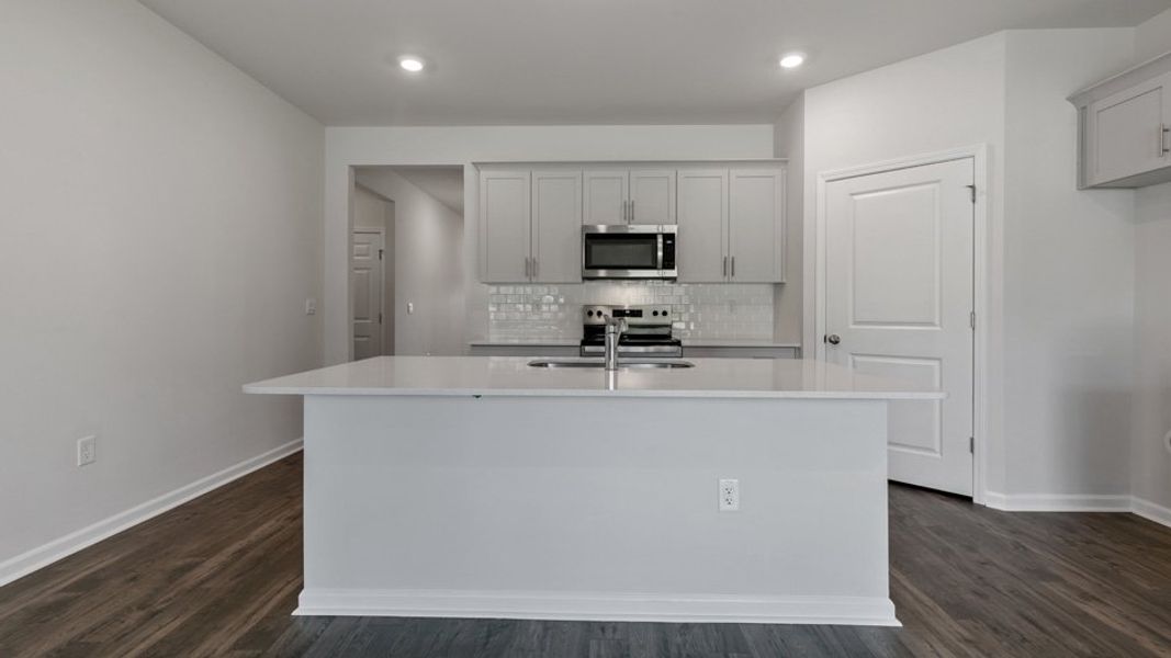 Representative furnished interior of a home built from the Cali by D.R. Horton in The Landing at Winston Pointe, Clayton (Image 5).