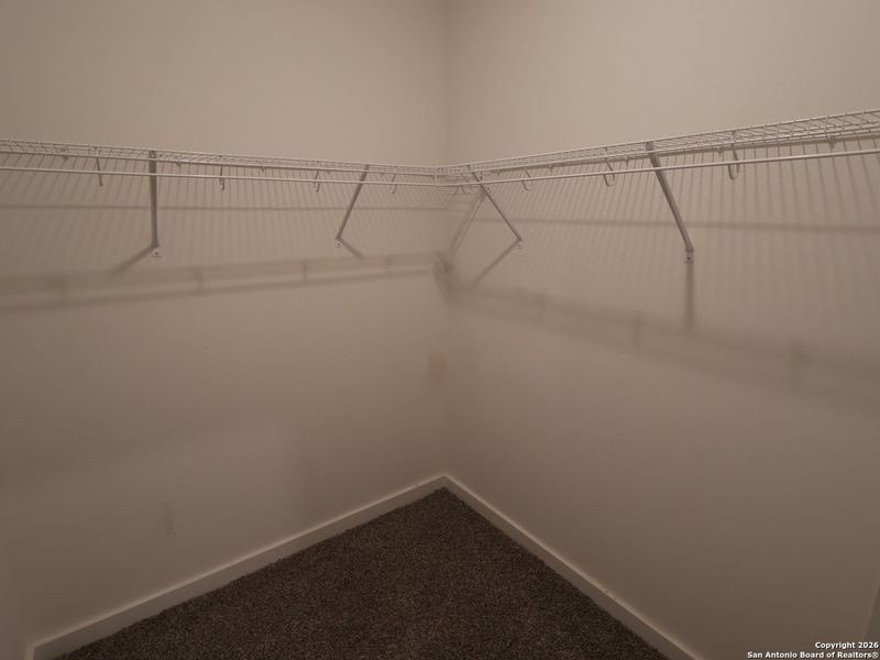 Spacious, unfurnished interior of a new home in Mesquite Ridge, San Antonio (Image 29).