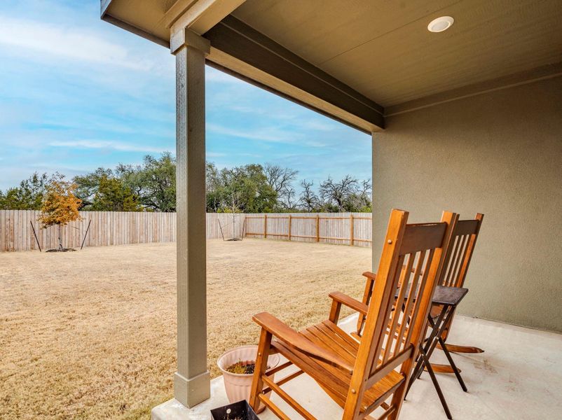 Exterior details and patio area of a home in Woodfield Preserve, Georgetown (Image 24).