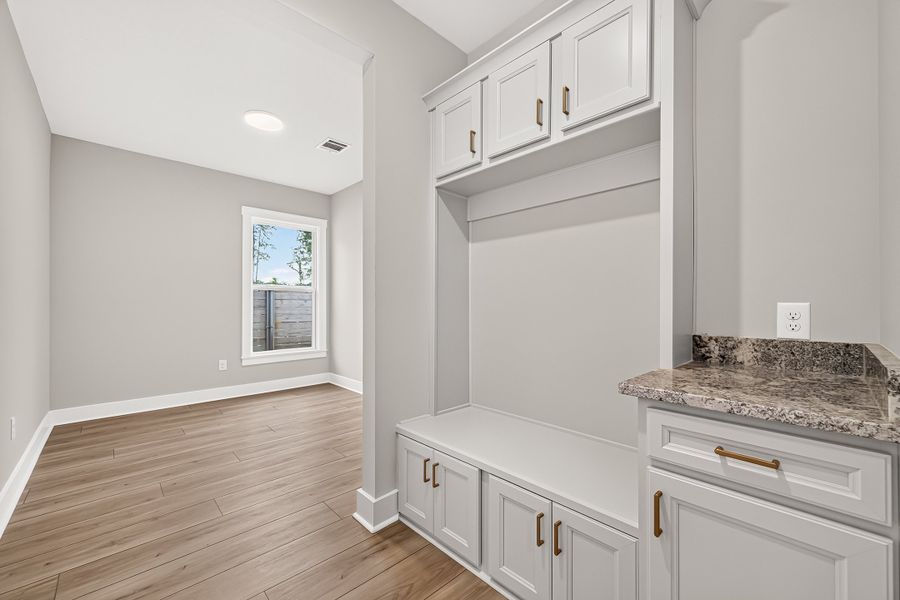 Furnished interior view inside a new home in Two Step Farm, Montgomery (Image 11).
