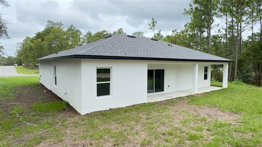 Front exterior of a new home in , Citrus Springs, FL, highlighting curb appeal (Image 17).