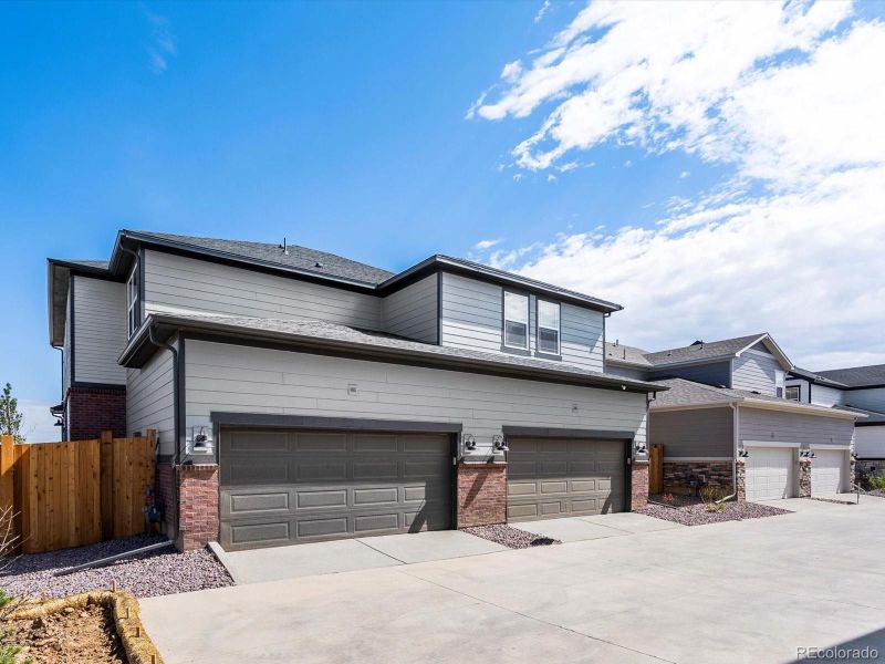 Exterior details and patio area of a home in Horizon Uptown: The Mountain Collection, Aurora (Image 4). Exterior details and patio area of a home in Horizon Uptown: The Mountain Collection, Aurora (Image 4).