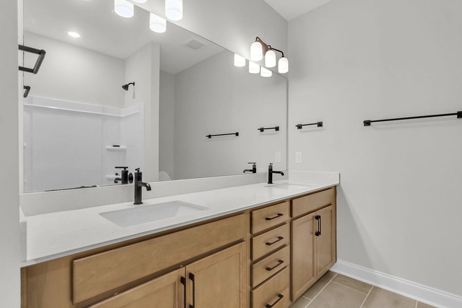 Furnished interior view inside a new home in Tidewater at Lakes of Cane Bay, Summerville (Image 13).