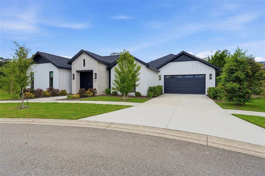 Front exterior of a new home in , Gainesville, FL, highlighting curb appeal (Image 2). Front exterior of a new home in , Gainesville, FL, highlighting curb appeal (Image 2).