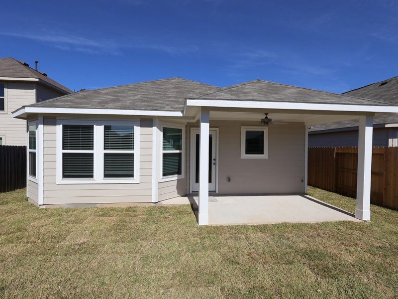 Exterior details and patio area of a home in Pinewood at Grand Texas, New Caney (Image 3). Exterior details and patio area of a home in Pinewood at Grand Texas, New Caney (Image 3).