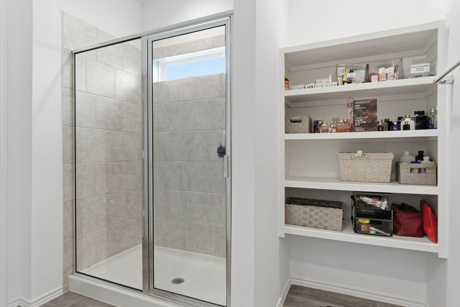 Luxurious ensuite with dual granite vanities, massive walk-in shower, and a large closet. Luxurious ensuite with dual granite vanities, massive walk-in shower, and a large closet.