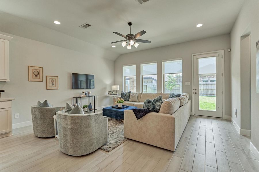 Abundance of natural light.  Motorized and pull-down shades.