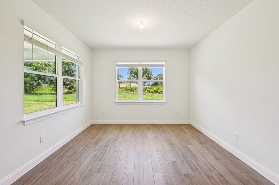 Spacious, unfurnished interior of a new home in Hampton Park - Signature Series, Vero Beach (Image 20).