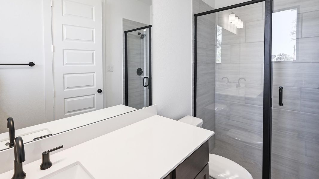 Furnished interior view inside a new home in 6 Creeks, Kyle (Image 15).