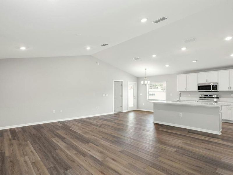 Enjoy a sunny, open layout with low-maintenance LVP flooring.
