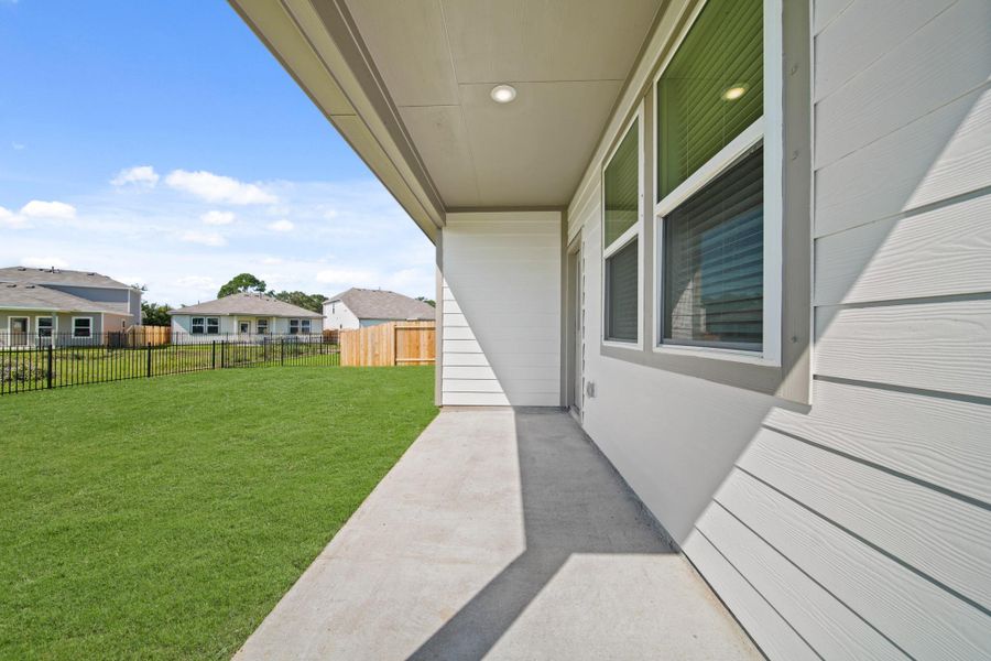 Exterior details and patio area of a home in Russell Ranch, Bay City (Image 17).
