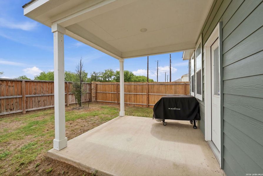 Exterior details and patio area of a home in Spring Creek, San Antonio (Image 29).