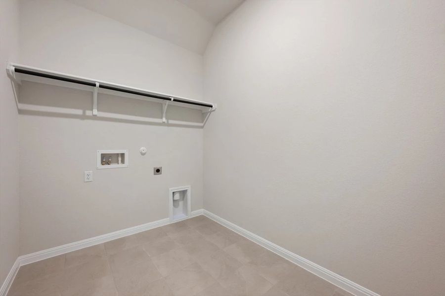 Spacious, unfurnished interior of a new home in The Colony 50s, Bastrop (Image 32).