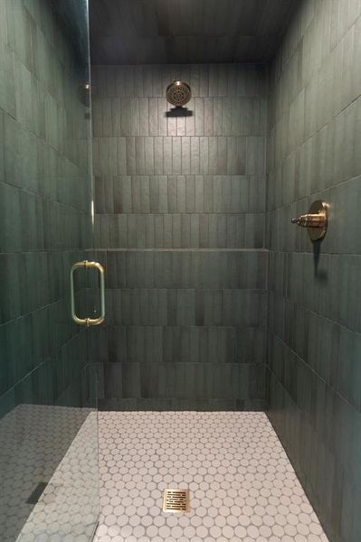 Full bath featuring a stall shower