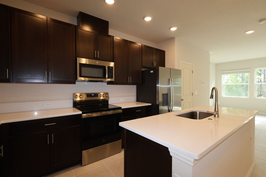Furnished interior view inside a new home in Preserve at The Cays – The Driftwood Series, Daytona Beach (Image 5).