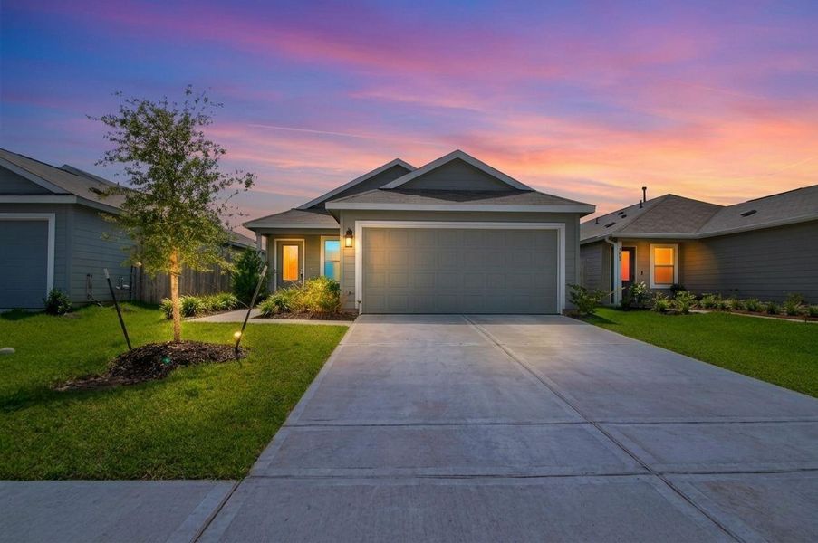 Front exterior of a new home in Wharton Lakes, Wharton, TX, highlighting curb appeal (Image 28).