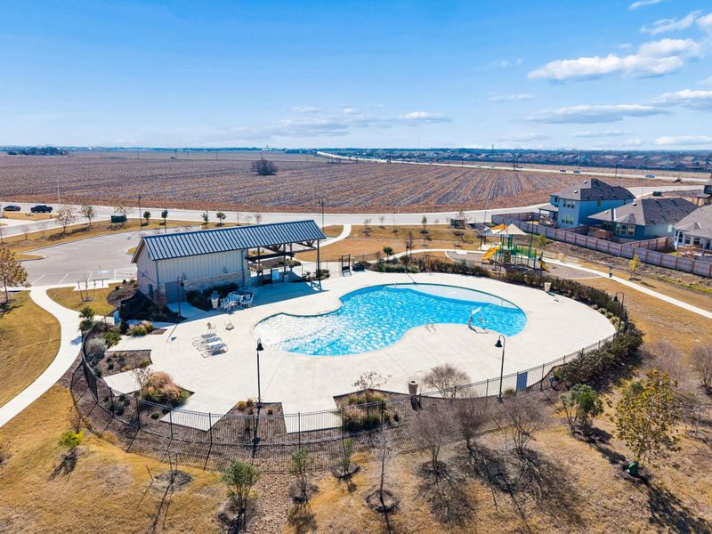 Aerial view of community pool and playground