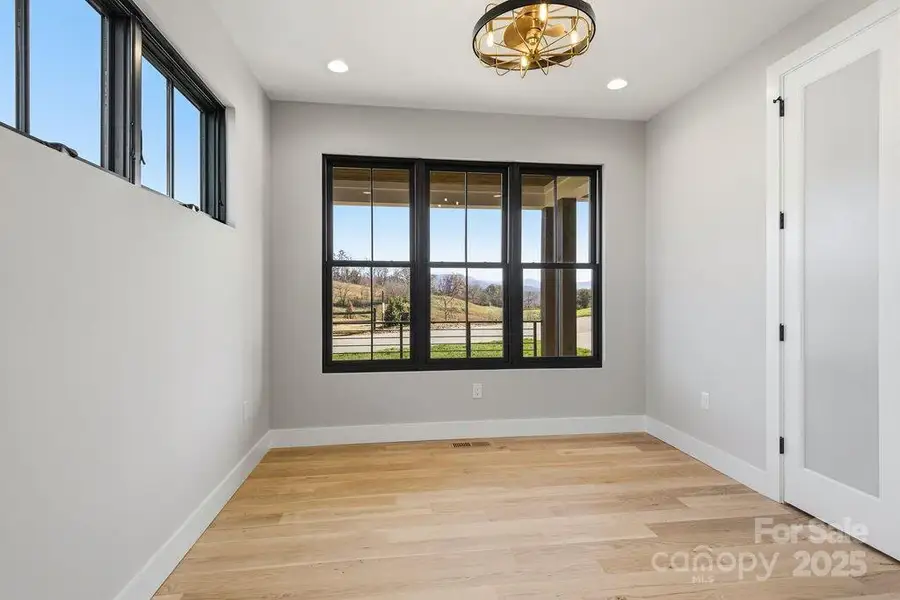 Flexible main-level guest/office space next to a full bath