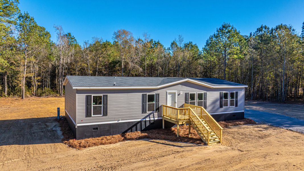 Exterior details and patio area of a home in , St. Stephen (Image 32). Exterior details and patio area of a home in , St. Stephen (Image 32).