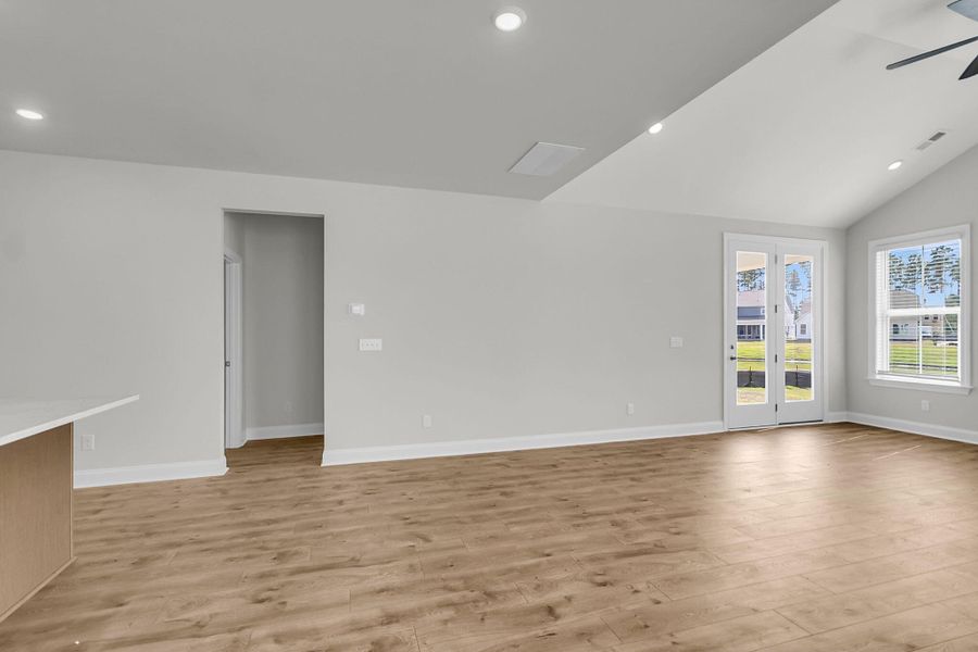 Spacious, unfurnished interior of a new home in Tidewater at Lakes of Cane Bay, Summerville (Image 19).