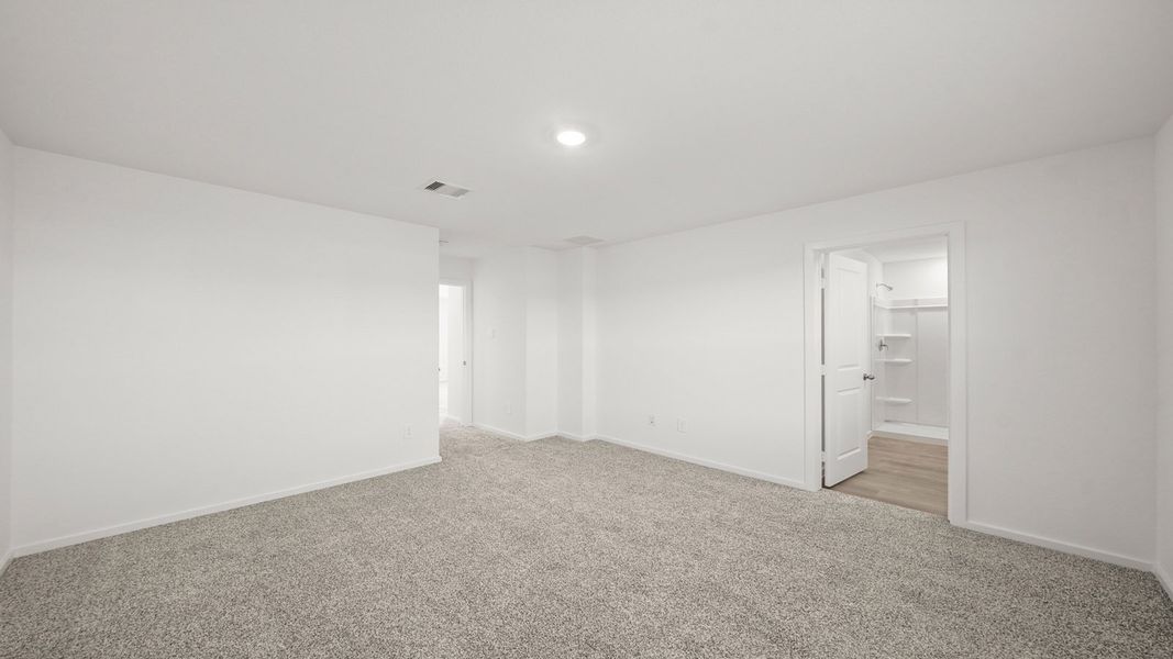 Representative unfurnished interior of a home built from the Dawson by D.R. Horton in Lexington Heights, Willis (Image 25).