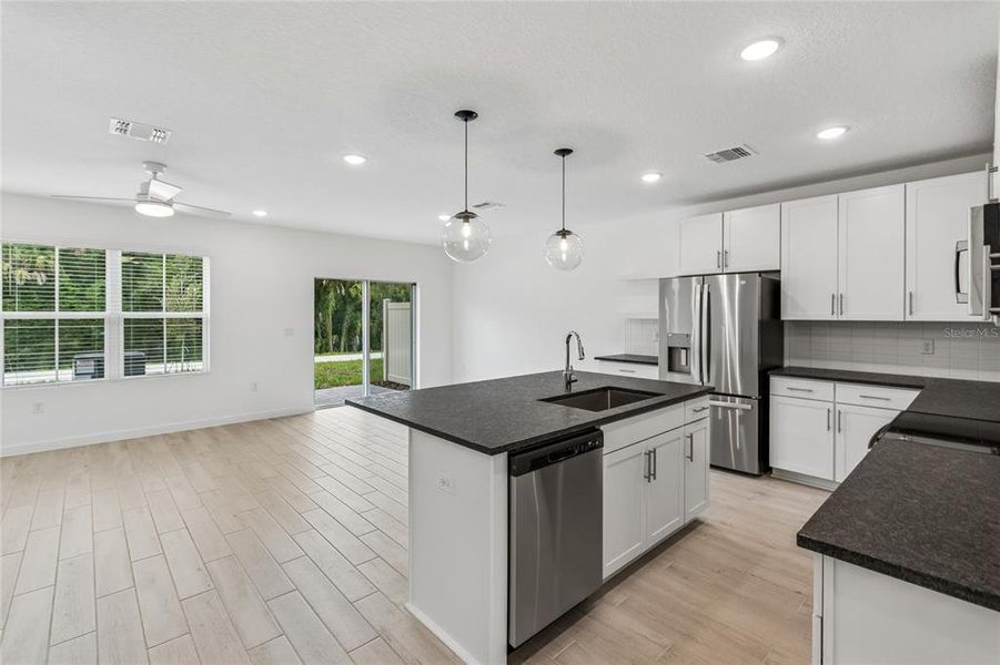 Furnished interior view inside a new home in Aspire at Canter Creek, Davenport (Image 11).