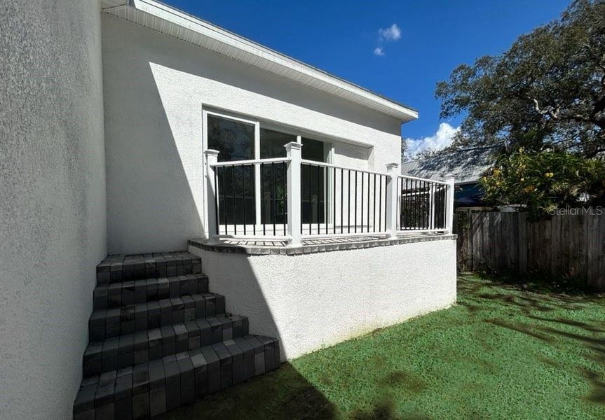 Exterior details and patio area of a home in , Crystal Beach (Image 4).