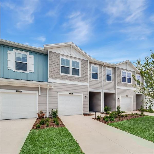 Front exterior of a new home in , Ocala, FL, highlighting curb appeal (Image 25).