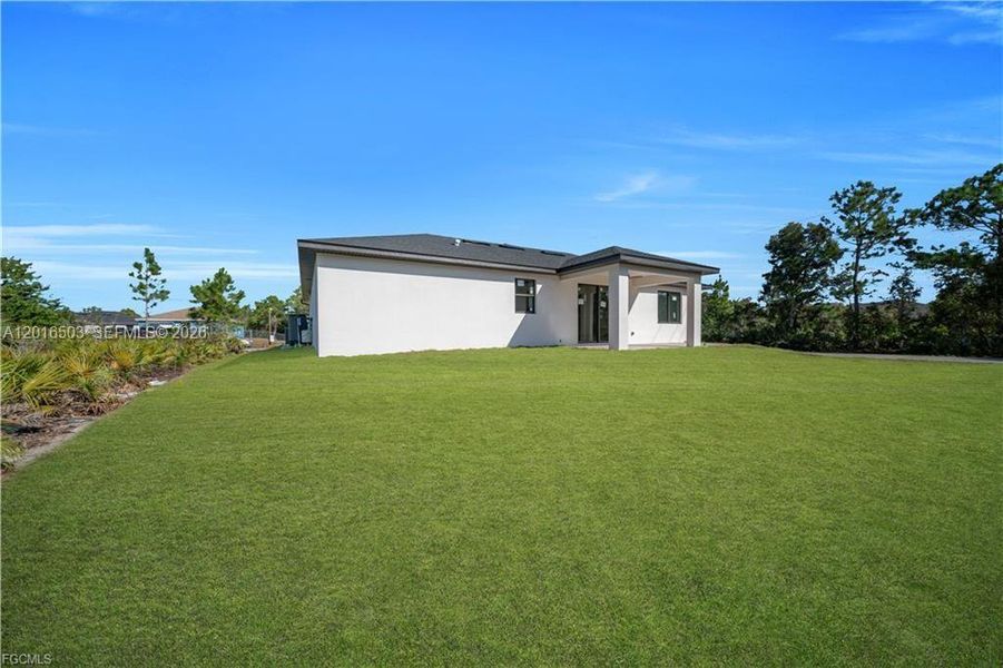 Exterior details and patio area of a home in , Lehigh Acres (Image 25).
