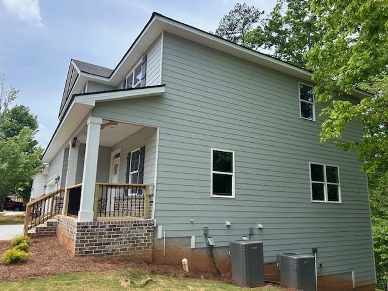 Exterior details and patio area of a home in Habersham Meadows, Demorest (Image 4).