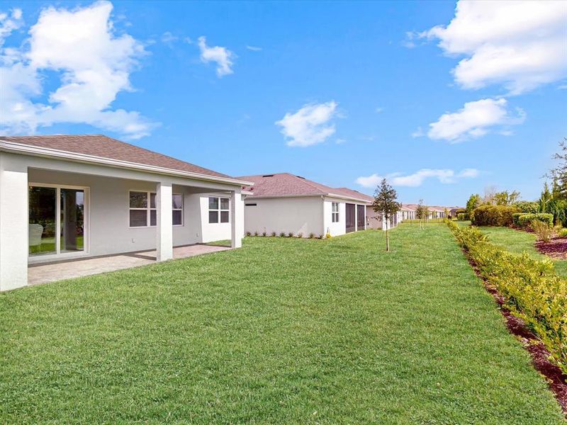 Exterior details and patio area of a home in Del Webb Sunbridge, St. Cloud (Image 26).