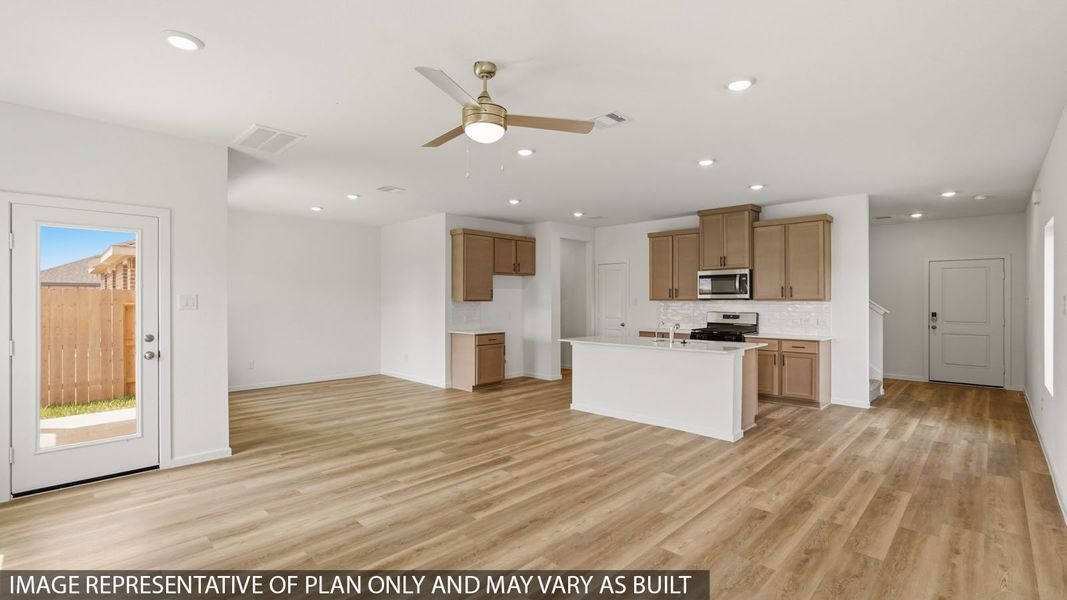 Furnished interior view inside a new home in Sunterra, Katy (Image 9).