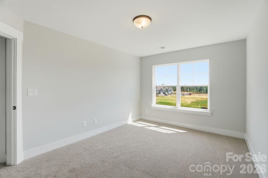 Spacious, unfurnished interior of a new home in Blythe Mill Townhomes, Waxhaw (Image 43).