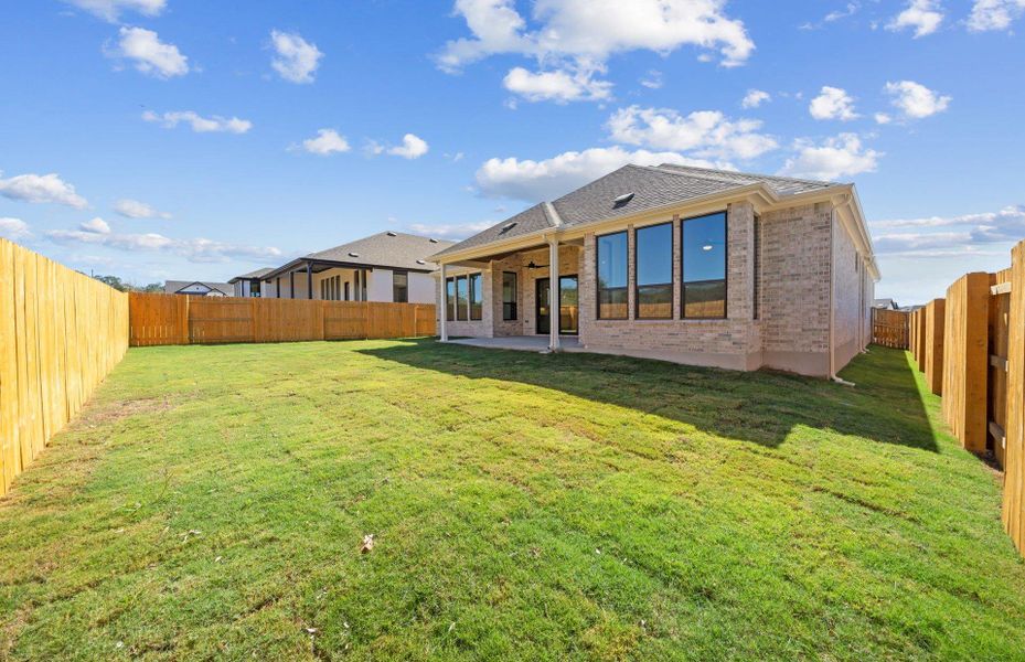 Exterior details and patio area of a home in 6 Creeks, Kyle (Image 24).