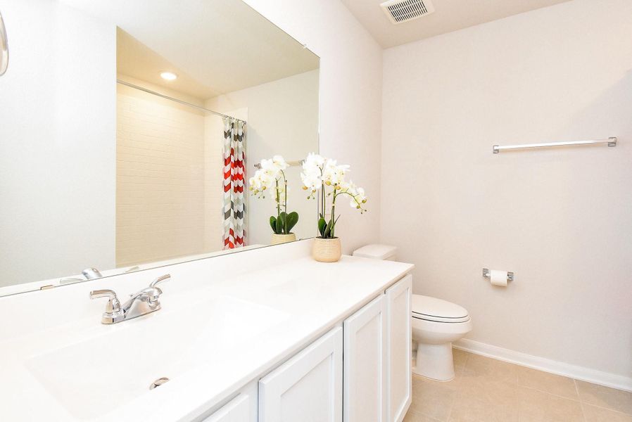 Secondary bathroom located upstairs for the secondary bedrooms. Secondary bathroom located upstairs for the secondary bedrooms.